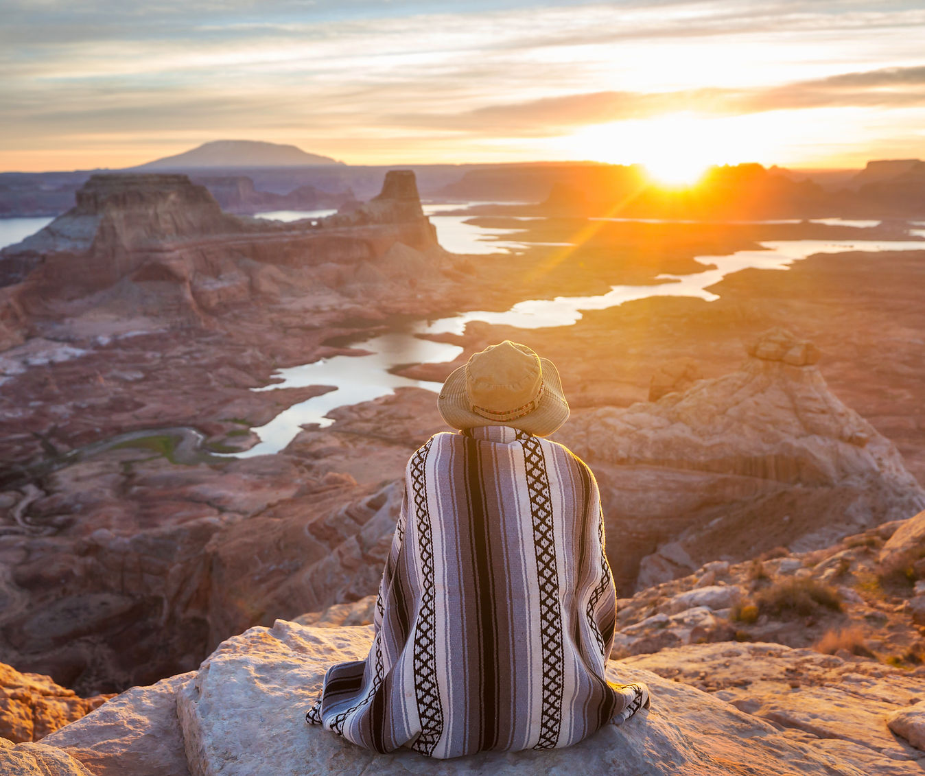 A quiet moment overlooking a sunlit desert canyon